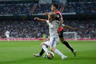 MADRID, SPAIN - APRIL 29: Edgar Antonio Mendez Ortega (R) of Almeria UD tackles Fabio Coentrao (L) of Real Madrid CF during the La Liga match between Real Madrid CF and UD Almeria at Estadio Santiago Bernabeu on April 29, 2015 in Madrid, Spain.  (Photo by Gonzalo Arroyo Moreno/Getty Images)